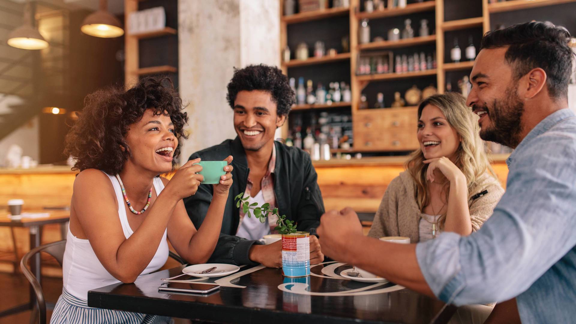 young adult friends enjoying coffee